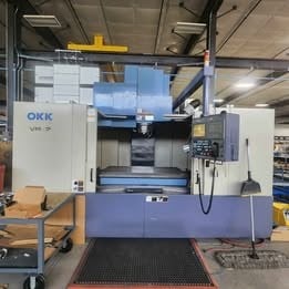 OKK #VM-7, CNC Mill, 60.2" X, 29.1" Y, 25.9" Z, Cat 50, 10000 RPM, Tooling Included, 2003, $22,900