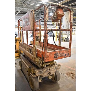 500 lb. JLG #CM-1432, electric scissor lift w/14' max vertical