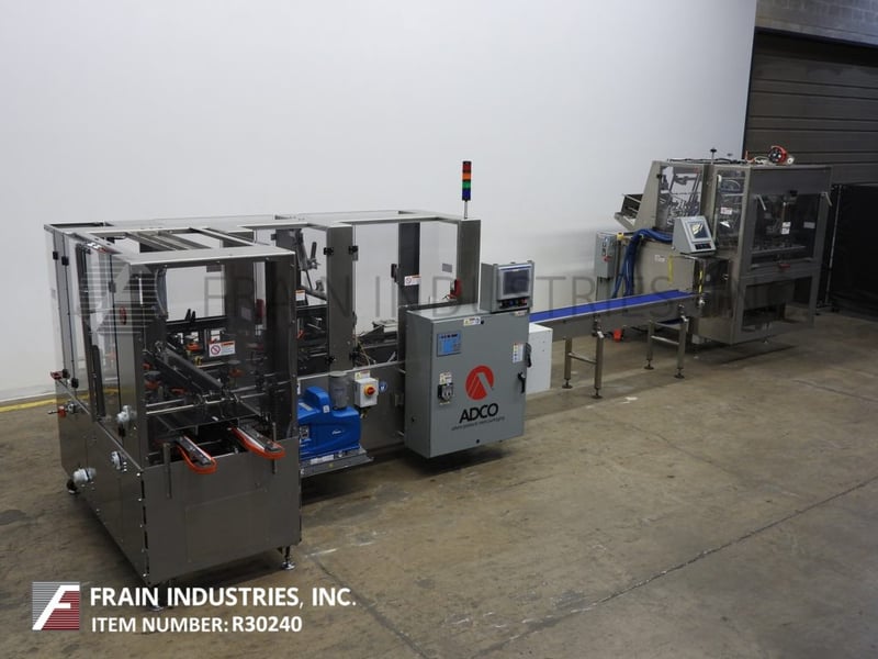 Complete triseal servo driven tray line, Adco AFCX3302SS, w/hot