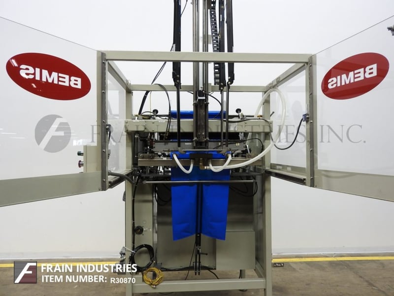 Bemis 1575, automatic, poly bag inserter, 515 bags/min., bag vacuum