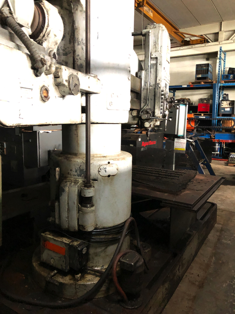 6' -9" Carlton radial arm drill, power elevation & clamping, box table, coolant system