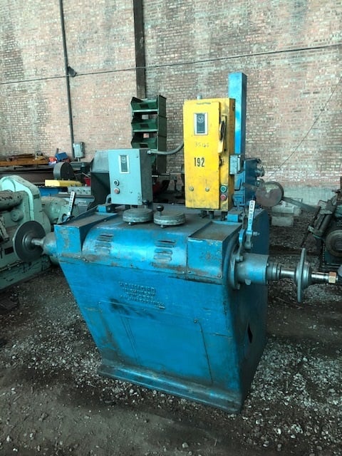 Hammond #7VRRO, vari-speed, two 7-1/2 HP motors, 1-1/4" dia. arbors, backstands & Torit #84