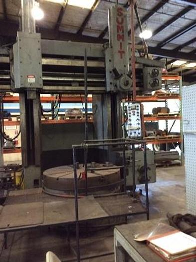 59" Summit, vertical boring mill, 59" 4-Jaw chuck, 70" Swing, 47" under rail, Ram, turret & side heads, 1976