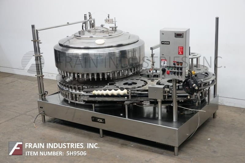 Federal #3615, automatic, 316 Stainless Steel, 56 head rotary, pressure gravity filler rated from 56-200