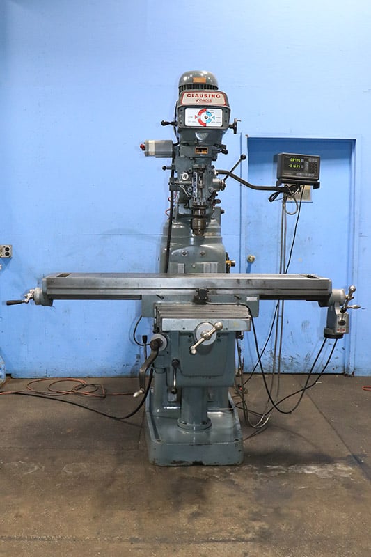 Clausing Kondia #FV-300, 11" x58" tbl., 4 HP, #30 quick switch, Mitutoyo 2-Axis digital read out, variable