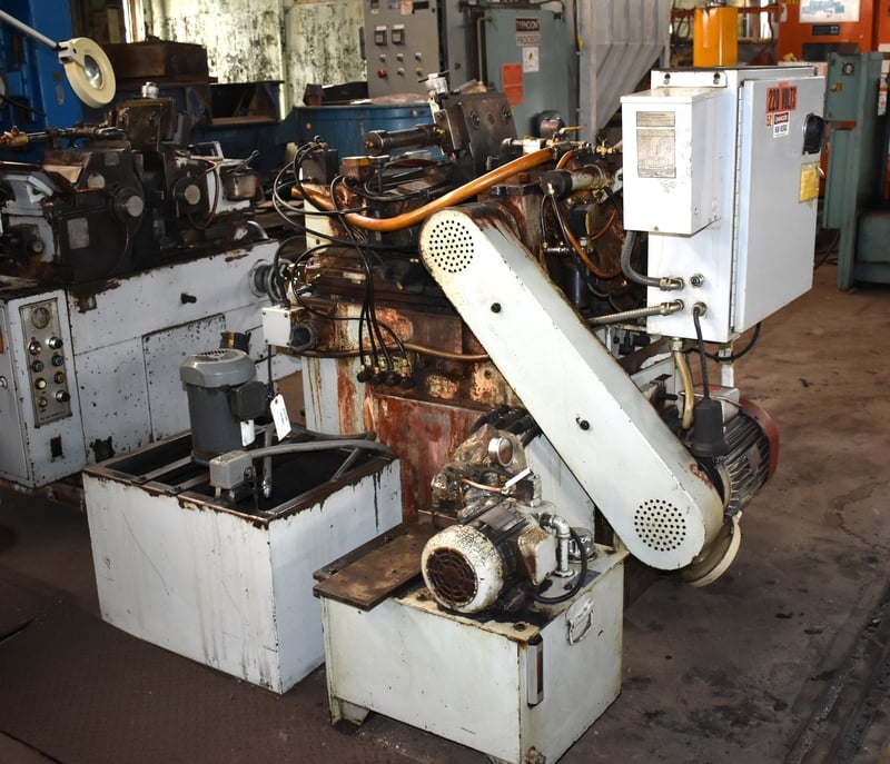 Unison No. U12, centerless grinder, hydraulic grinding wheel truing
