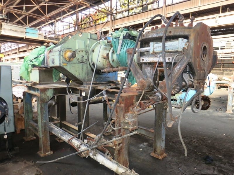 NRM, 6 x 6 Duplex extruder, 20" wide tread head, Reliance 100 HP 1750/2000 RPM 500 V. DC motor