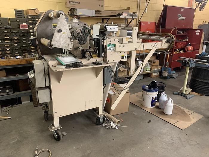Dusenbery #633AC, 26" wide, 15" rewind diameter, 300 FPM, Micro 1000 web guide