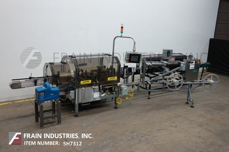 Trine #4500GS, Stainless Steel, roll fed, wrap around, hot melt glue labeler and shrink tunnel rated from