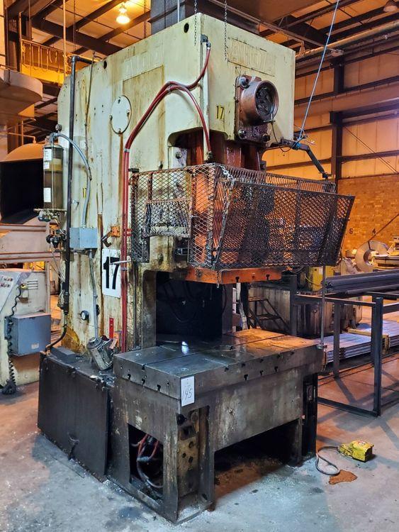 121 Ton, Aida #C1-11, gap frame press, 7" stroke, 13.7" Shut Height, 3.94" adj., 30-50 SPM, 56" x26" bed, air