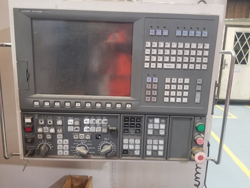 Okuma #MCV-A2, OSP-P200M CNC control, 60 x 162 table, 78 Y-travel, 50  taper, 4000 rpm, 72 tool stations, 80 between the columns 2007 for Sale