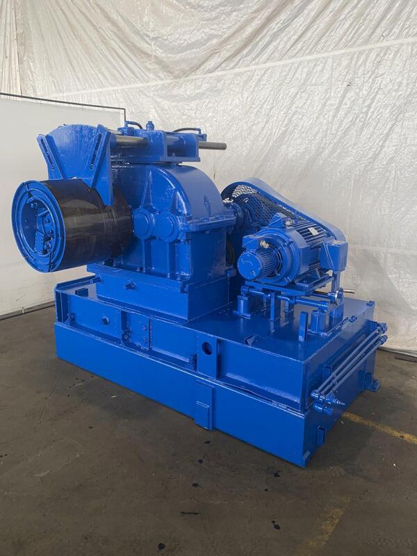 20000 lb. Pro-Eco Recoiler, 20" width, 16"-21.5" expansion range, holddown arm, air operated disc