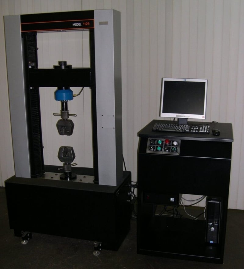 22500 lbf. (100kN) Instron #1125 Extra Wide, 38" Compression Testing Opening, 30" x24" T-slot table