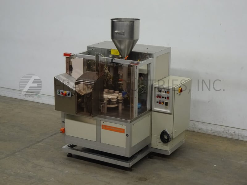 Norden #NM400HA, automatic, hot air, plastic or laminate tube filler and sealer rated from 10-40 tubes per