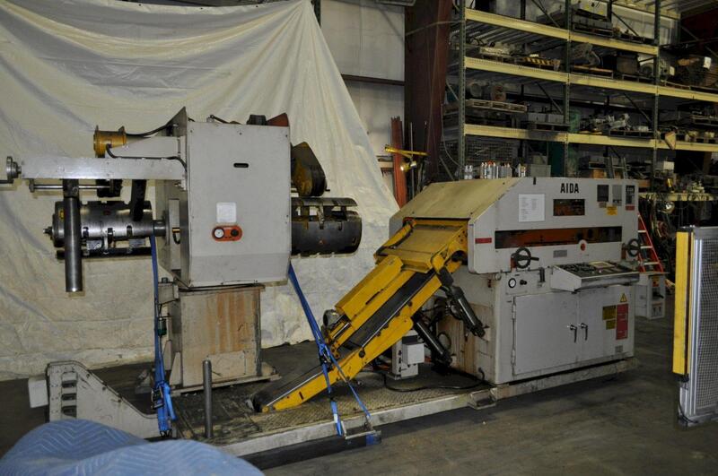 6600 lb. Aida #LFG-600R(1), space saver coil feed line, 55" OD, 16"-20" ID, 18.11" x .125" straightener