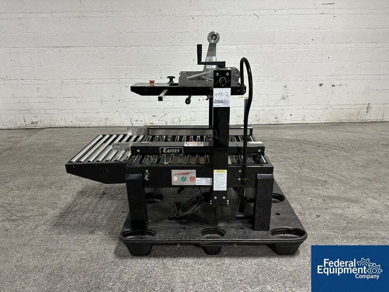 Eastey #B-3EX-STD-4, case taper, upper and lower tape heads, side drive belts driven by .25hp, 110 volt