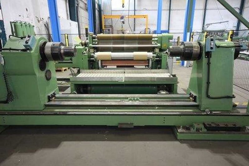 49" Kampf #RKW406, foil slitting line, 39" unwind diameter, 27.5" rewind diameter, 2600 FPM
