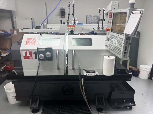 Haas #TL-1, CNC lathe, 20" swing, 16" cut diameter, 30" cut length, full enclosure, tailstock, hand wheels