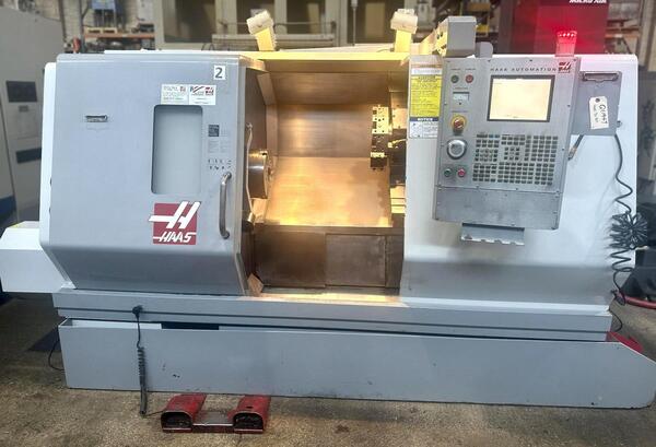 Haas #SL-30T, CNC lathe, 3-jaw 12" chuck, 30" swing, 39" centers, 3.5" bore, 3400 RPM, 12-position turret