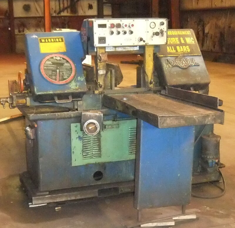 12" x 13" DoAll #C-1213A, band saw, w/ vice on roller stand and extra roller stand, coolant, extra blades
