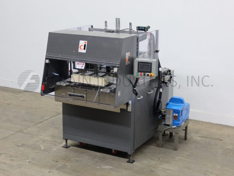 Automatic dual head tray former, Delkor #752, up to 150 trays per minute