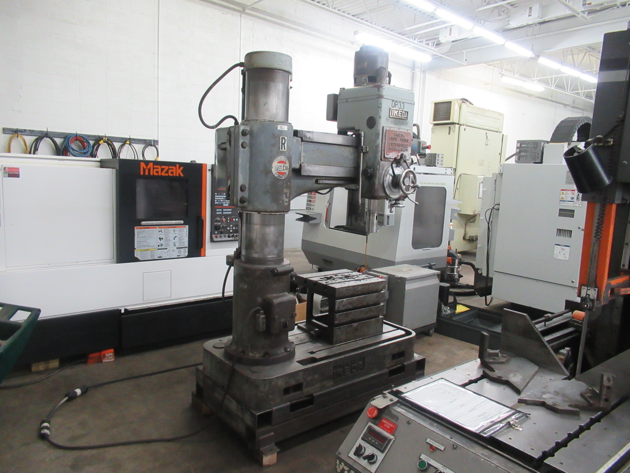 3.6'-11" Ikeda #RM1000, radial arm drill, power clamping, power elevation, box table, 3 HP