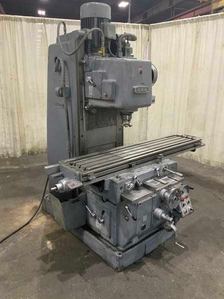 OKK #MH-3V, vertical milling machine, 14-1/4" x65" table, 3-Axis, power feeds, automatic lube, #50NS