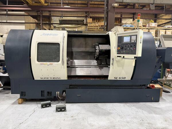 Johnford #SL-650, CNC lathe, 22.8" swing, 10" chuck, 3" bar, 60" centers, 16.5" dia., A2-8, 12 turret, 3500