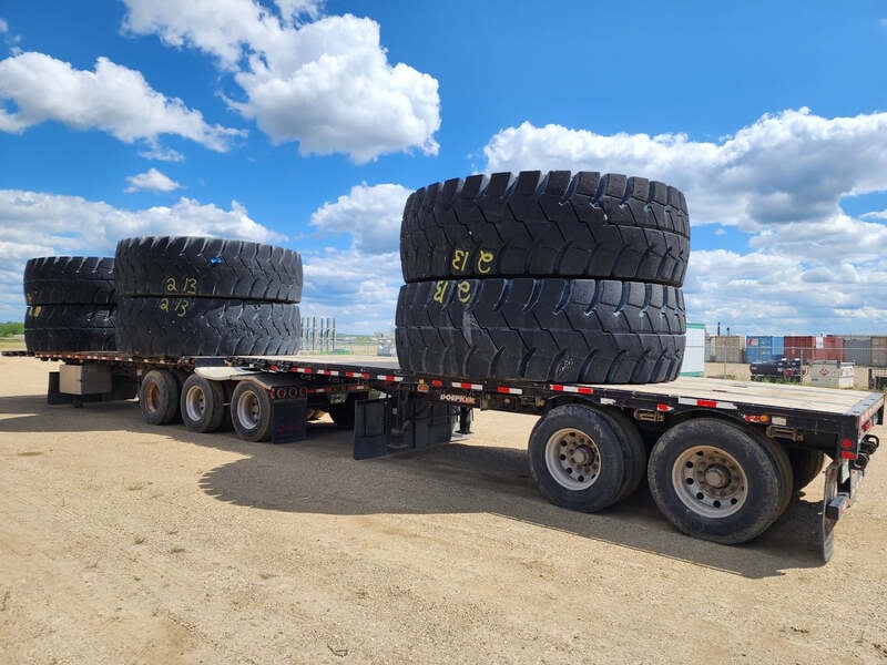 Komatsu #46/90R57 tires (66%-80% tread) for 830E-1DC haul truck