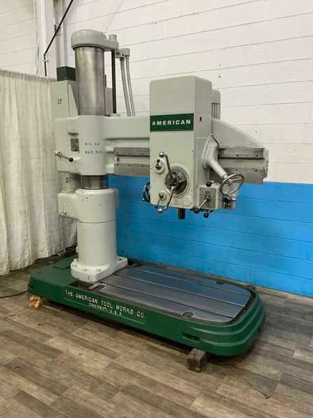 4' -11" American, radial arm drill, 57" x 35" base, power elevation, 5 HP