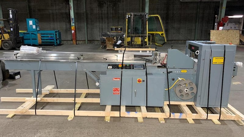 Shanklin #F-5A, automatic side seal shrink system with Shanklin T-7XL shrink tunnel