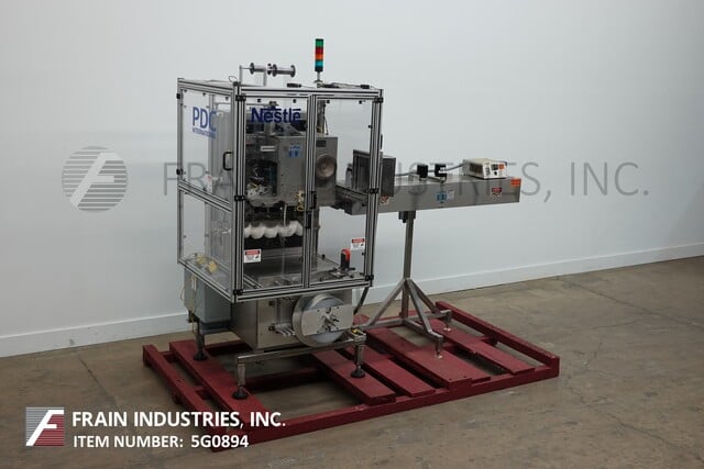 PDC #75-ERL, fully automatic sleever / neck bander rated from 1