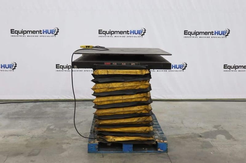 2500 lb. Autoquip, hydraulic lift table, hand Control, 11"-47" height