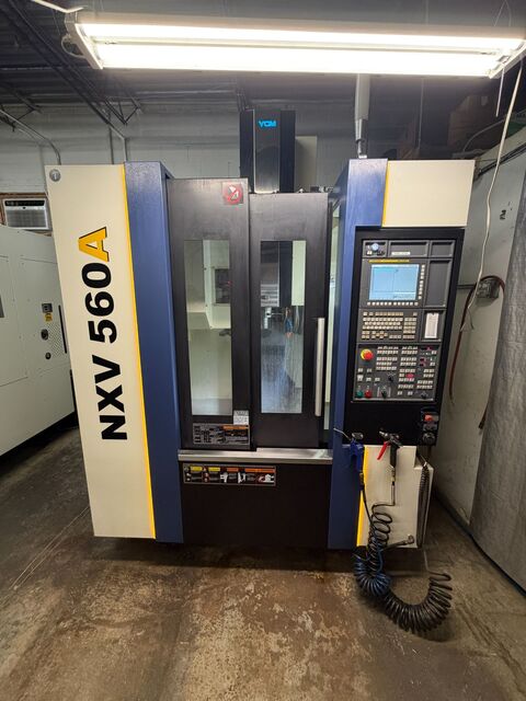 YCM #NXV-560A, vertical machining center, 22.1" X, 16.1" Y, 17.7" Z, 25 HP, 12 RPM, 24 automatic tool