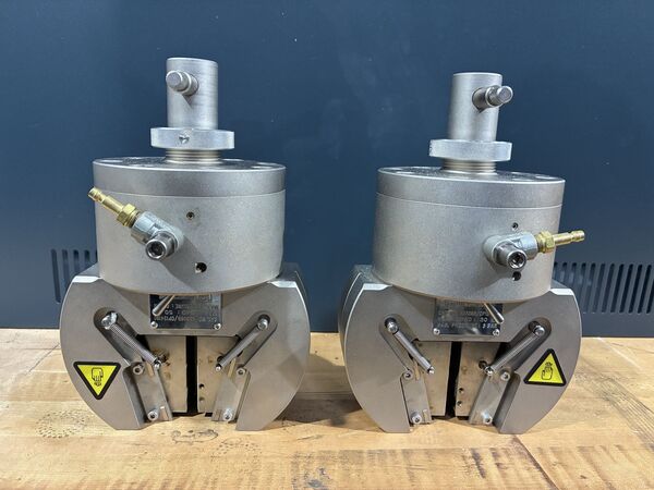 Instron #S5306B, 50 kN pneumatic wedge grips, 87 psi