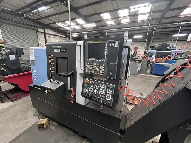 Daewoo Doosan #Lynx-2100M, CNC lathe, 23.6" swing, 6" chuck, 2" bar, 13.78" dia., 13" lgth, 12 turret, 20 HP