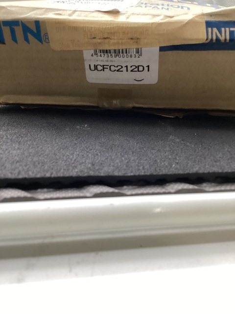 Ntn #ucfc212d1, flange bearing unit 60mm cast iron, new