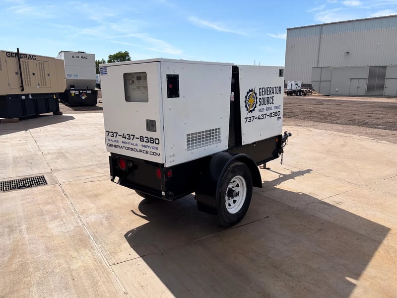 45 KW Magnum #MMG55F14, diesel generator, trailer/SAE, voltage selector switch, 2007