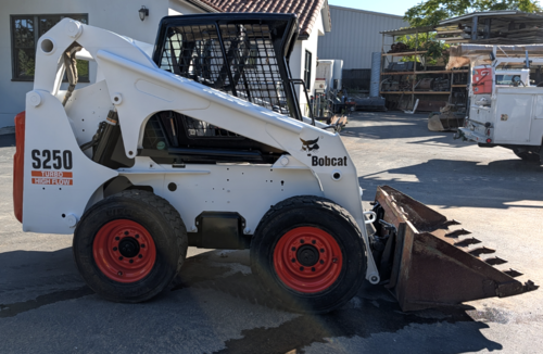 7800 lb. Bobcat #S250, wheel loader, suspension seat, 2 speed, keyless control pad, 75 HP