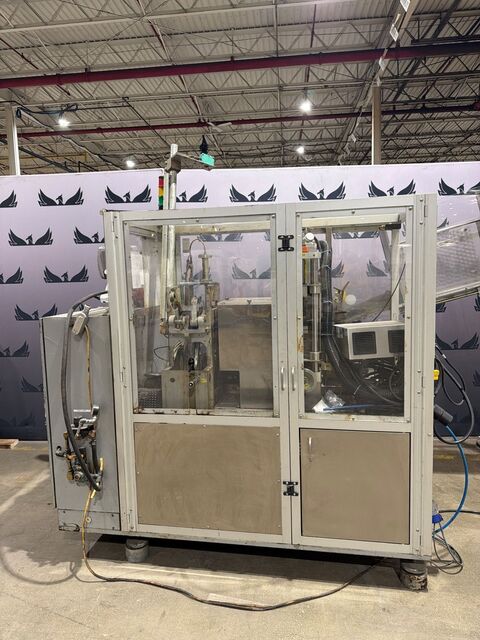 Norden #NM702, automatic tube filling machine with domino laser m