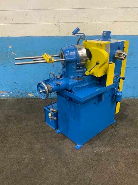 1/2" to 3" Oliver #600, drill grinder, 28" drill length, 9" cup type grinding wheel, Airdraulic automatic air
