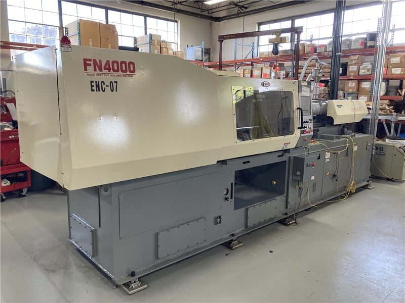 200 Ton, 9.1 oz., Nissei #FN4000, 20.9" x 20.9" tie bars, 30.3" x 30.3" platen, 1-3/4" barrel, 93T Control