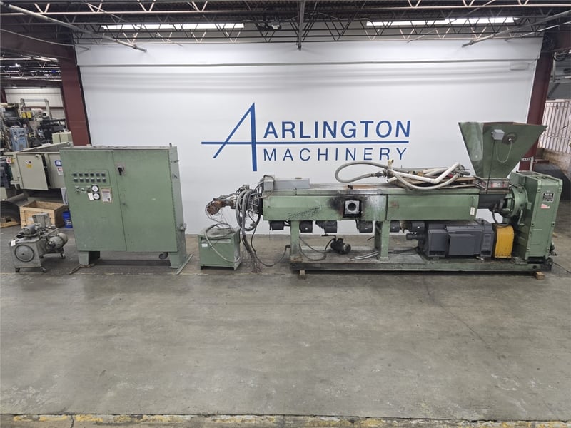 4.5" NRM, single screw extruder, 34:1 L/D, 300 HP DC motor, 6 barrel zones, 6 downstream zones, air cooled