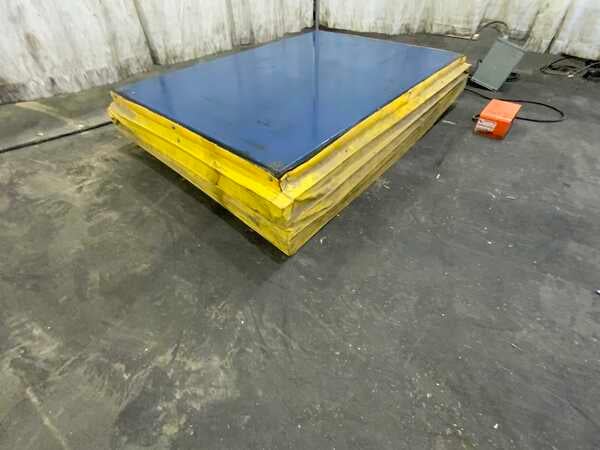 2000 lb. Bishamon, hydraulic lift table, 42" raised height, dual cylinder, electric foot trip, 440 V.