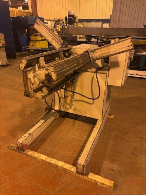6000 lb. Feed-Lease, motorized uncoiler, 36" width, 60" outside dimensions, 16"-20" ID, manual expansion