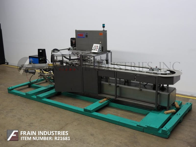 Tisma #TC-50E, semi-automatic vertical hand load cartoner set for a glue closure rated from 30-150 cpm