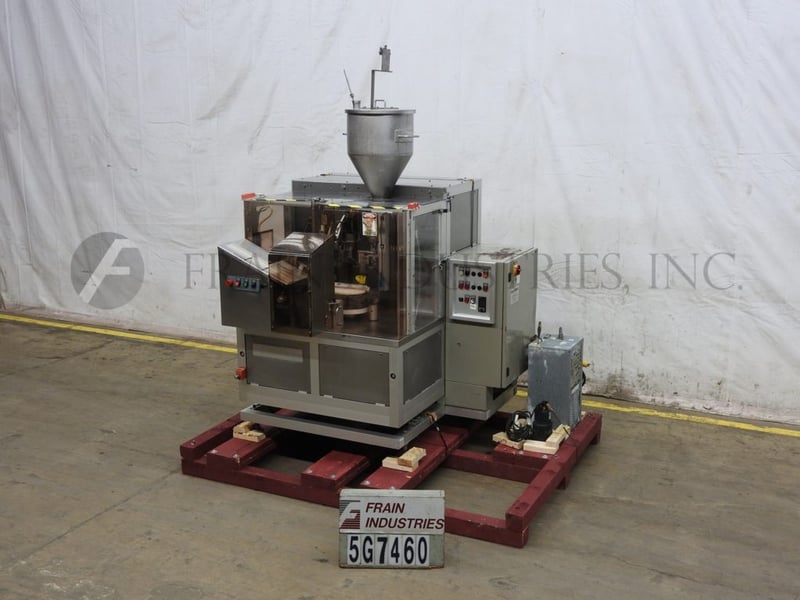 Norden #NM400HA, automatic, hot air, plastic or laminate tube filler & sealer, 10-30 tubes/minute