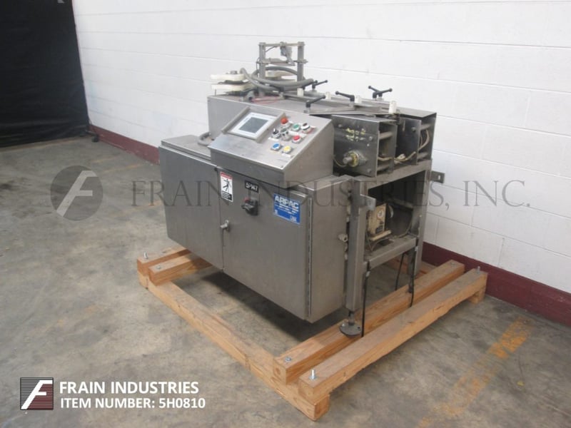 Arpac #70LS, lugged infeed conveyor, with dual star wheel indexing, AB ...