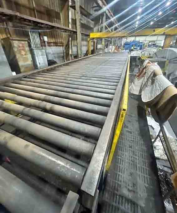 15000 lb. Braner, banding line conveyor, 72" outside dimension, 3.5" diameter x 76" face rolls, 25' L, 58"