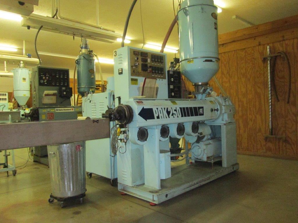 2.5" Akron #PAK-250, extruder, 24:1 L/D, air cooled, 40 HP DC, 2 screws, hopper dryer w/ loader, 1995 - Image 1